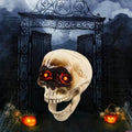 Animerat Halloween-skeletthuvud med blinkande ögon