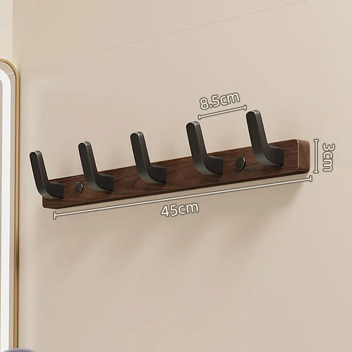 Minimalistisk Väggmonterad Klädhängare med Trä- och Metallklädhängare