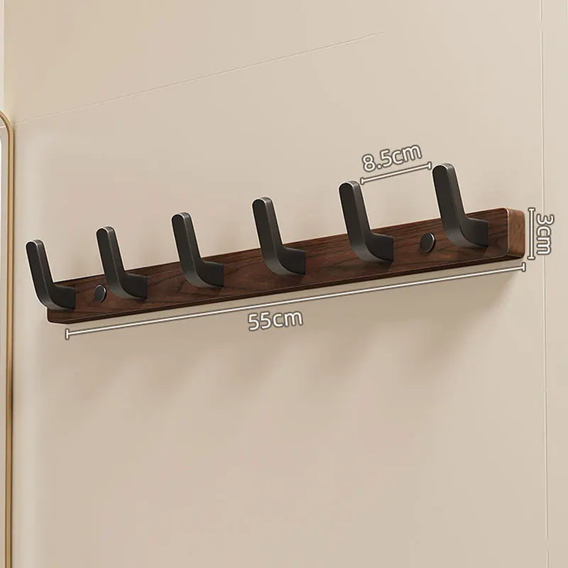 Minimalistisk Väggmonterad Klädhängare med Trä- och Metallklädhängare