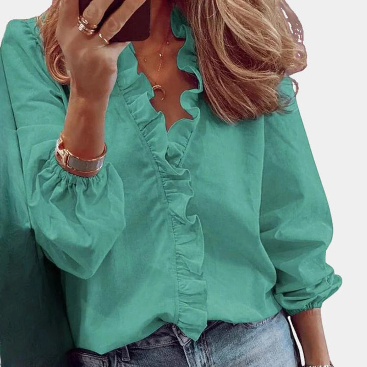 Elegant och Trendig Damblus
